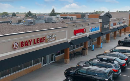 Outdoor shopping center in St. Paul Minnesota - Expert commercial retail property painting services.
